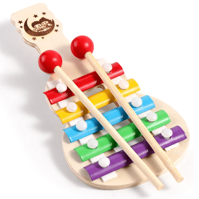 Guitar-shaped wooden xylophone toy with rainbow coloured keys and two red-tipped mallets, designed for toddlers and young children