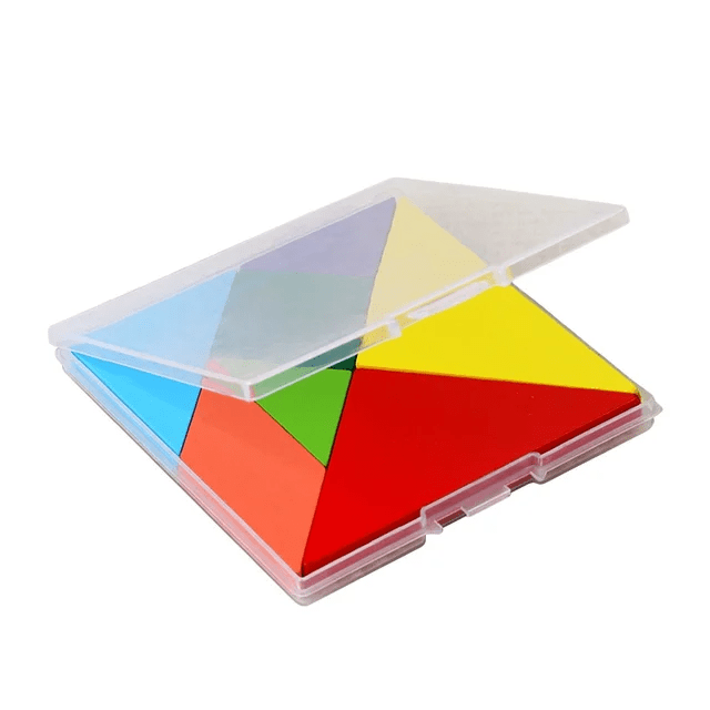 Colourful tangram puzzle pieces in red, green, yellow, blue, orange and pink scattered outside a clear plastic storage box on a blue and yellow background