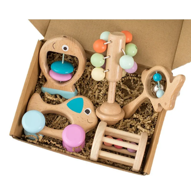 Five-piece wooden newborn baby rattle and shaker set featuring a bird rattle