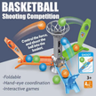 Toy basketball shooting competition set with colorful components on a white surface.