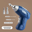 Blue rotary tool with attachments on a brown background