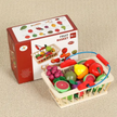 Pretend play fruit basket set for kids with colourful plastic fruits including grapes watermelon apple orange and lemon in a wire basket