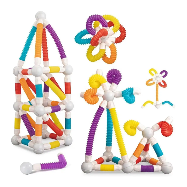 Colorful geometric building set with various shapes on a white background