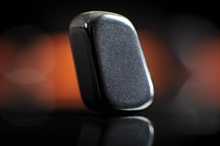 Magnetic object on a reflective surface with a blurred background