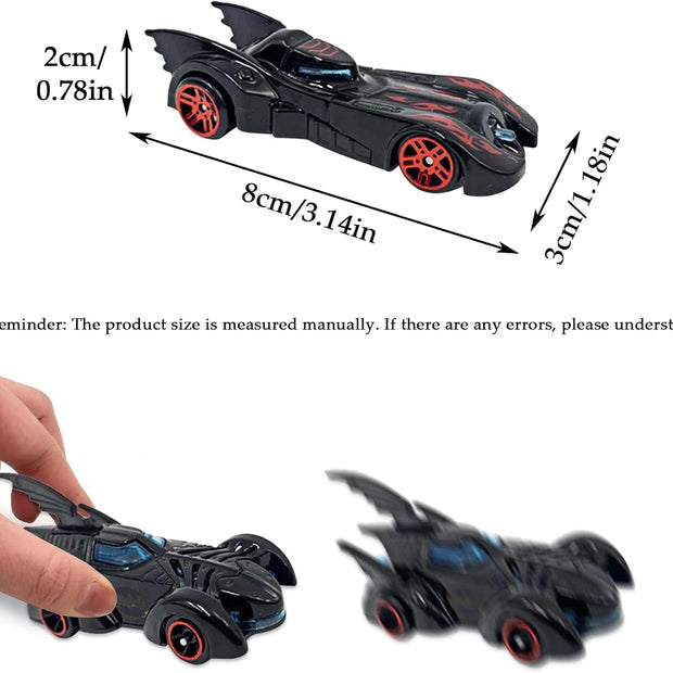 Toy Batmobile with measurements and a hand for scale on a white background