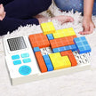 Tetris-like puzzle game with colorful blocks on a white surface