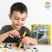 Child playing with building blocks in front of a toy packaging labeled 'Multificence' with Spark Toy logo.