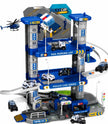 Multi-storey police station parking garage playset with spiral ramp, four police vehicles, helicopter, helipad and accessories for kids pretend play