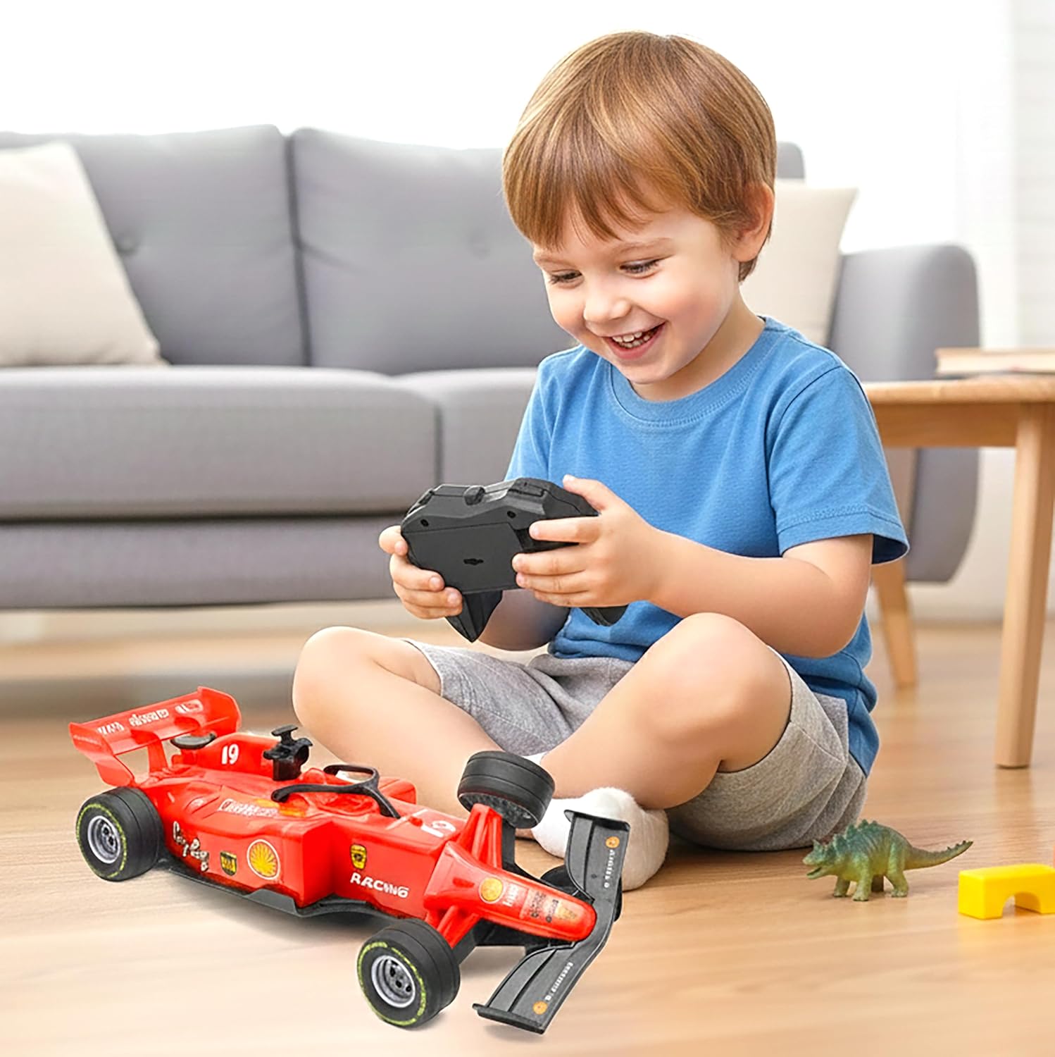 Child playing with a red toy car and remote control in a living room.
