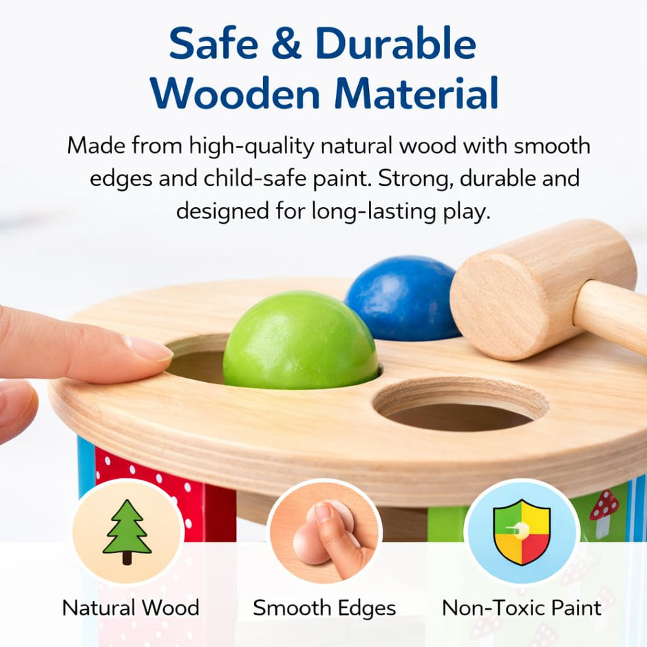 Wooden toy with colorful balls and a hammer, labeled as safe and durable with natural wood, smooth edges, and non-toxic paint.