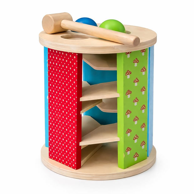 Wooden hammer and ball roll tower toy for toddlers with pastel pink, blue and green panels, three coloured balls and a wooden mallet