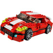 Red toy car made of interlocking bricks on a white background